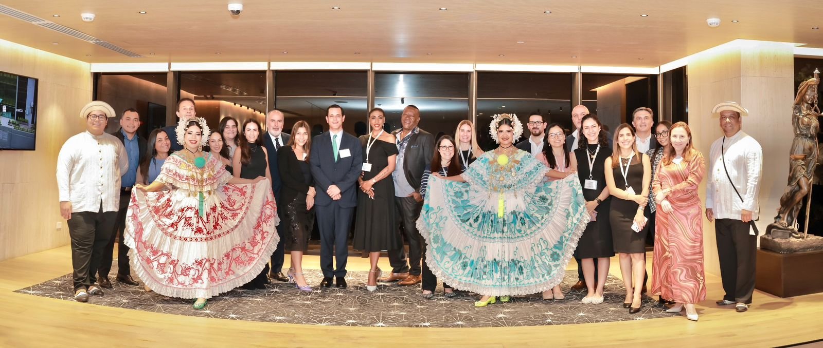 Primerus delegates with Panamanian cultural performers in traditional dress